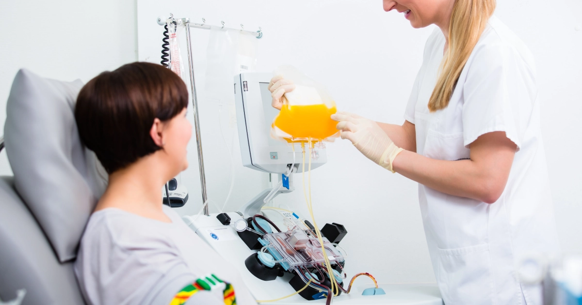 Therapeutic Plasma Exchange procedure with nurse assisting patient in Denver CO