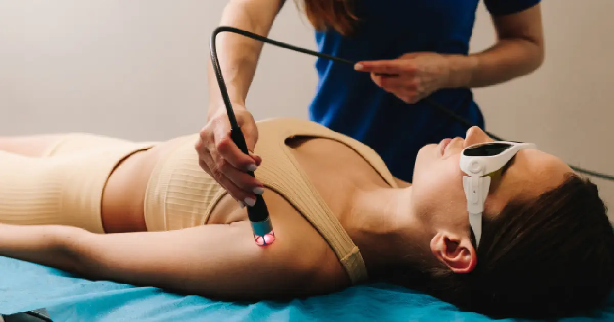 A Women receiving Low-Level Laser Therapy in Denver, CO for Support Immune Function